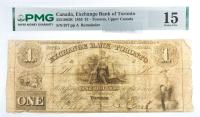 1855 $1 Canada, Exchange Bank Of Toronto, Toronto, Upper Canada. PMG graded Choice F 15 Signatures, Serial Numbers & Cor