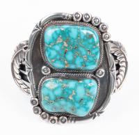 Two Spectacular, Highly Polished Nevada Turquoise are Enhanced by Extremely Appealing Silver Tooling