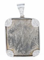 Munionalusta Meteorite Pendant from Sweden in 14K White Gold Bezel with Accent Diamonds at each Corner.