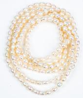 Fine Strand of Premium Freshwater Pearls Individually Knotted with an Impressive 64" in Length.