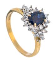 Ladies Deep Blue Sapphire Ring Surrounded by Bright White Diamonds in 18K Yellow Gold. Could Easily Double as an Engagem