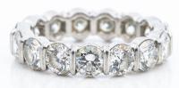 Ladies Beautiful Eternity Ring in Platinum with 16 Bright White Diamonds, ~17 Points Each.