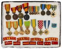 Outstanding Collection of Vietnam Related Medals, Sewn Patches, and a Variety of Vietnam Service Medals