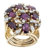 A Spectacular Ladies Cluster Ring with 8 Rubies Randomly Set in a Field of Diamonds Both Marquis and Round.