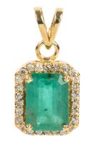 Ladies 14K Yellow Gold, Diamond and 5 Carat Emerald Pendant.