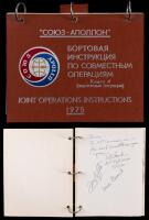 Apollo/Soyuz: Rare Joint Operations Flip Book. "Emergency Procedures Checklist" Autographed by Tom Stafford and Vance Brand