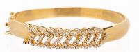 Ladies 18K Yellow Gold Hinged Bracelet with 60 Bright White Diamonds in a Feather Pattern