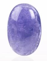 Oval Tanzanite Cabochon: 31.85 Carats Having a Beautiful Semi-Transparent Violet Blue Color