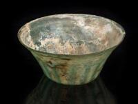 Large Roman Blown Glass Molded Bowl of Translucent Green Glass with Vertical Ribbing Completely Surrounding Vessel. 2nd-4th Cent