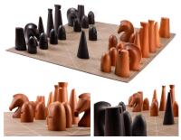 Magnificent and Rare Herm&egrave;s Chess Set, Large Size with Roll-Out Leather Board. Stunning Chess Pieces Hand-Carved of Cass