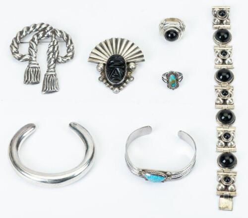 Seven (7) Sterling Silver Pieces from the Southwest and Mexico Including Two Cuffs, One Link Bracelet, Two Rings and Two