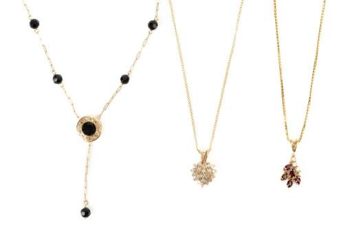Three Wonderful Pendant Necklaces for the Lady; 14K Yellow Gold, Rubies, Diamonds and Onyx
