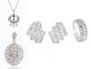Ladies 14K White Gold and Diamond Collection. Beautiful Pair of Earrings, a Pendant of the Symbol Horus, a Deco Style Pendant an