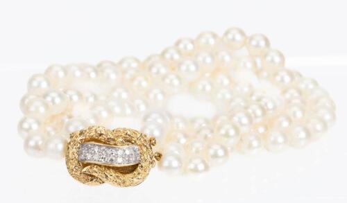 Ladies Lovely Double Strand of Cultured Pearls Enhanced by a Beautiful 18K Yellow Gold and Diamond Clasp Usually Worn to the Sid