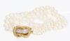 Ladies Lovely Double Strand of Cultured Pearls Enhanced by a Beautiful 18K Yellow Gold and Diamond Clasp Usually Worn to the Sid