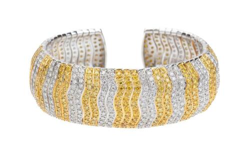 Beautiful 18K White Gold Cuff Bracelet with Alternating Bands of Approximately 1000 Yellow and White Diamonds Totalling 5 Carats