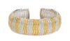 Beautiful 18K White Gold Cuff Bracelet with Alternating Bands of Approximately 1000 Yellow and White Diamonds Totalling 5 Carats
