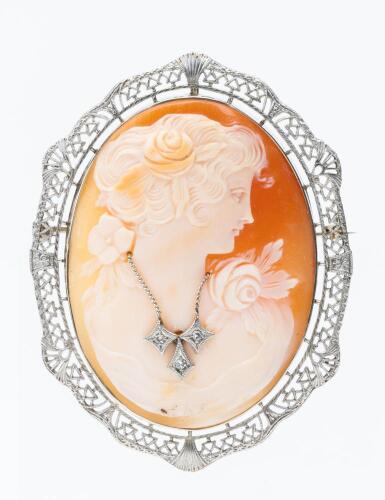 Exceptional 14K White Gold and Shell Cameo. Tiny Accent Diamonds Create the Illusion of a Necklace. Beautiful Piece