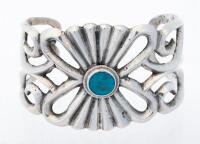 Handsome Sterling Silver and Turquoise Cuff with an Appealing Open Work Foliate Design