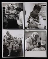 Gemini 3: 20 Photos of John Young, 14 in his Space Suit During Training and Pre-Flight, Six Candid Shots Including Medical Tests