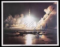 Crew Signed Apollo 17 Photograph of its Dramatic Nighttime Launch. Ron Evans, Harrison H. Schmitt and Gene Cernan