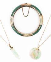 Two Jade Pendants each on 14K Yellow Gold Chains and a Hinged Jade Bracelet.