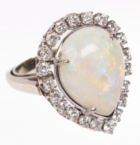 Ladies Beautiful Diamond and Pear Shaped Opal Cabochon Surrounded by White Diamonds in 14K White Gold. Opal Has Exceptional Fire