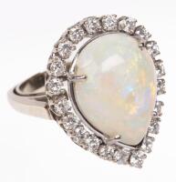 Ladies Beautiful Diamond and Pear Shaped Opal Cabochon Surrounded by White Diamonds in 14K White Gold. Opal Has Exceptional Fire