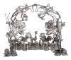 Appealing, Late 19th Century Menorah, 800 Silver with an Explosion of Birds, Vines, Foliage and Blossoms Forming an Arch Over th