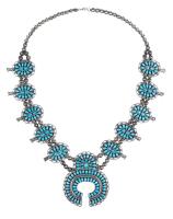Superior Sterling Silver and Sleeping Beauty Turquoise Squash Blossom Necklace by Celebrated Navajo Artist, Larry Moses Begay, 1