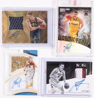 Nikola Jokic: Two Autographed Basketball Cards and 2 Autographed Card with Fabric Swatches form Game Worn Fabrics.