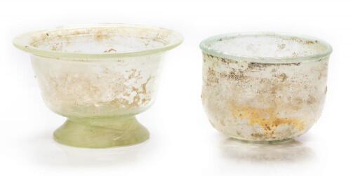 Roman Glass: Two (2) Roman Glass Beakers in Translucent Pale Green Glass ca. 2nd-3rd Century A.D.