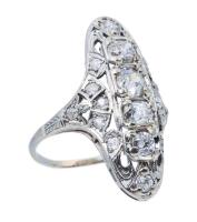 Antique Platinum Ring Boasting Old European Cut Diamonds in an Art Deco Shield Style Ring.