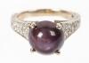 Ladies Mint 18K White Gold Star Ruby Cabochon Ring with Pave Diamonds Set the Entire Length of the Shanks.