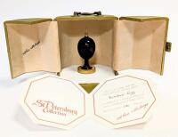 The Theo Faberg&Atilde;&copy; Scribes Egg: Presentation Writing Instrument and Egg Stand made of Rare Wood and 24K Gilt Gold