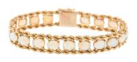 Beautiful Ladies 14K Yellow Gold Bracelet with 19 Opals Having Great Fire. 9.5 Carats of Opals