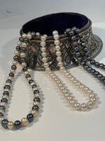 Three Cultured Pearl Necklaces, One in White Pearls, One of Black Pearls and One in Alternating White and Black