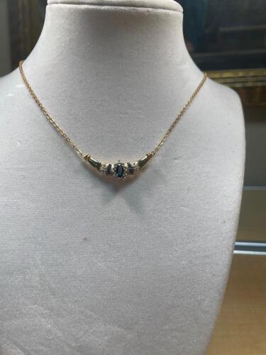 Ladies Sapphire and Diamond Necklace in 14K Yellow Gold in a Contemporary Crescent Shaped Design