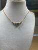 Ladies Sapphire and Diamond Necklace in 14K Yellow Gold in a Contemporary Crescent Shaped Design
