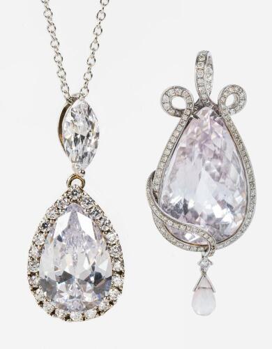 Two Dazzling Near Colorless Topaz Tear Drops set In Sterling Silver and One Sterling Silver