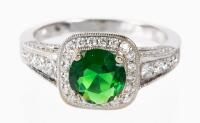 Ladies New, Never Worn, 14K White Gold, Emerald and Diamond Ring. Brilliant Cut .66 Carat Emerald Boasts Phenomenal Color.