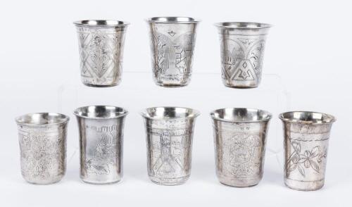 Eight (8) 19th Century 84 Zolotnik Silver Kiddush Cups Beautifully Engraved with Village Scenes or Extravagant Foliate Designs