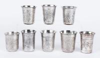Eight (8) 19th Century 84 Zolotnik Silver Kiddush Cups Beautifully Engraved with Village Scenes or Extravagant Foliate Designs