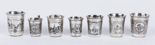 Seven Russian Kiddush/Vodka Cups, all 84 Silver with Niello Inlays and all Having Striking, Expertly Engraved Cityscapes