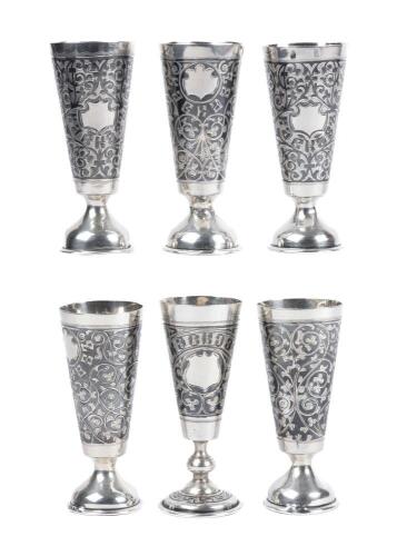 Six Russian Trumpet Shaped Kiddush Cups in 84 Silver Having Superb Craftsmanship: A Matching Trio, a Matching Pair and a Single