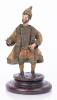 Small Sculpture Featuring Original 17th-Century Clothing