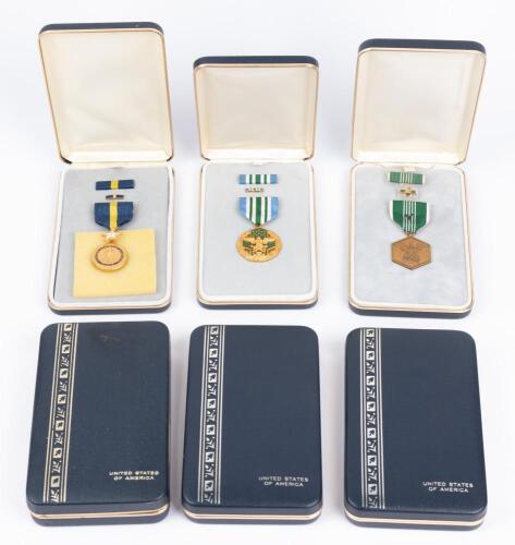 Six Military Medals Including: The US Navy Distinguished Service Medal and the US Army Commendation Medal