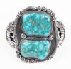 Two Spectacular, Highly Polished Nevada Turquoise are Enhanced by Extremely Appealing Silver Tooling