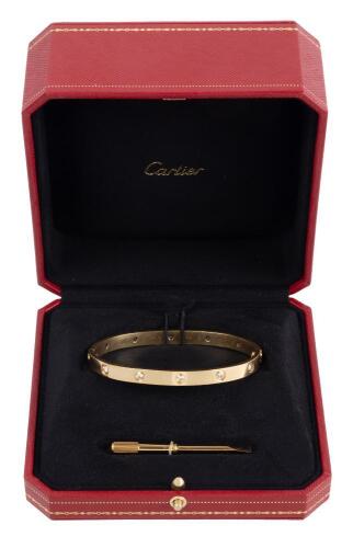 Second Ladies or Gents Cartier Love Bracelet in 18K Yellow Gold and 10 Diamonds Totaling Shy of One Carat.