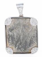Munionalusta Meteorite Pendant from Sweden in 14K White Gold Bezel with Accent Diamonds at each Corner.